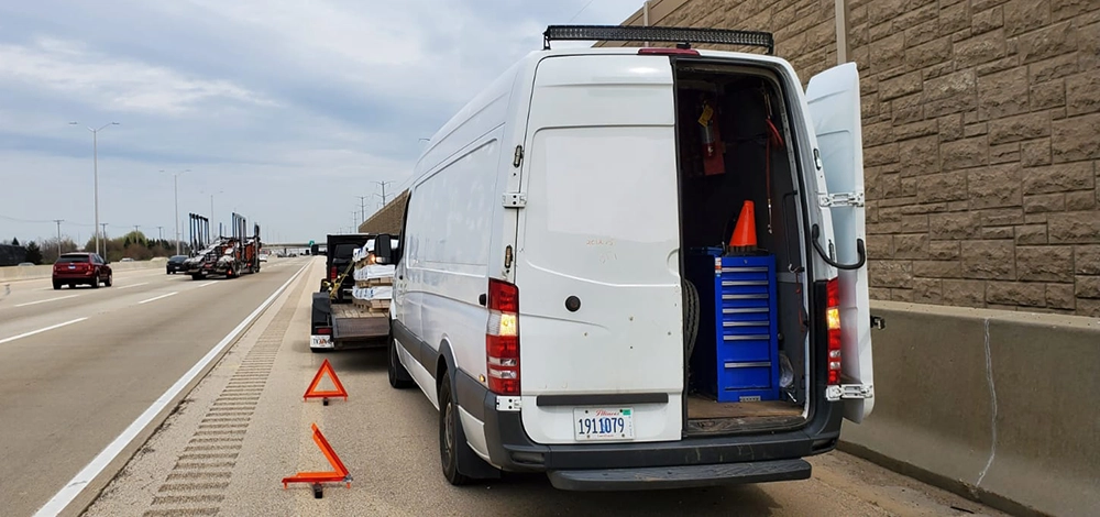 Queens Mobile Tires van on the highway